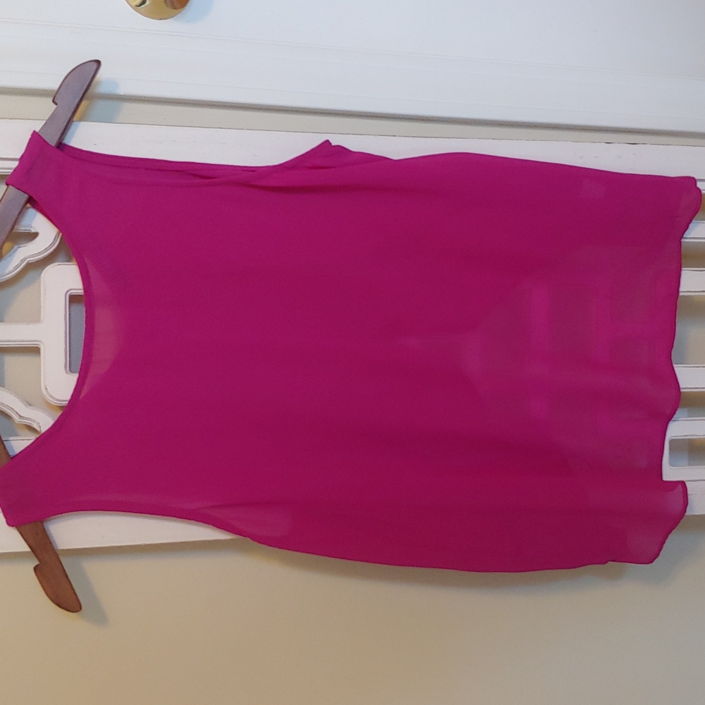 Medium open back bow tank top